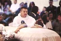 Grieving parents Rodrigo and Sujey Lopez at the casket of the their son Andy Lopez