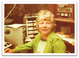 Elaine B. Pine (now Holtz) at the studio of Radio KBBF producing her show Women's Spaces in 1978 .